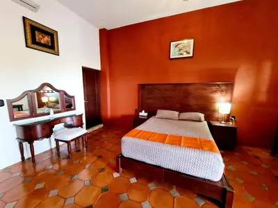 Cama o camas de una habitación en Hotel Alondra
