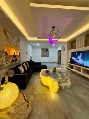Una televisión o centro de entretenimiento en Casa Rubi
