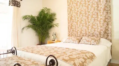 Cama o camas de una habitación en Sayaná House