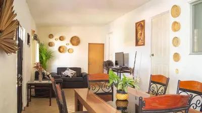 Zona de estar de Sayaná House