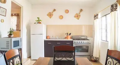 Una cocina o zona de cocina en Sayaná House