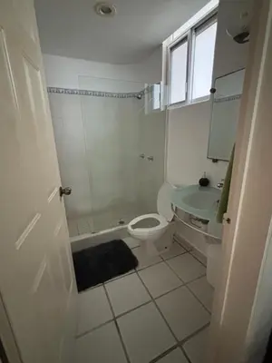 Un baño de Acogedor depto Acapulco Diamante frente a campo de Golf Vidanta