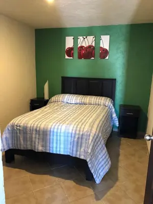 Cama o camas de una habitación en Departamento con Terraza