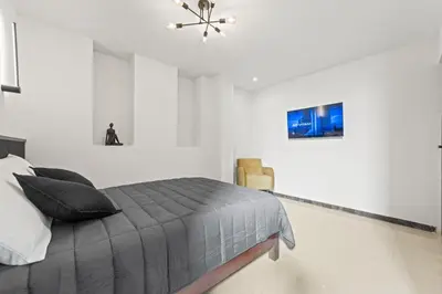 Una televisión o centro de entretenimiento en Hotel Boutique Árbol de la Vida