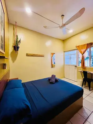 Cama o camas de una habitación en Costa Rentals Palmar & Wasi