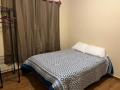 Cama o camas de una habitación en CASA FAMILIAR en SAN ANTONIO de la CAL 1