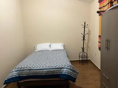 Cama o camas de una habitación en CASA FAMILIAR en SAN ANTONIO de la CAL 1