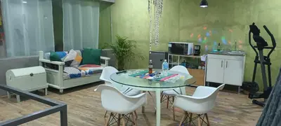 Una televisión o centro de entretenimiento en Departamento tipo Loft
