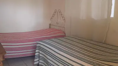 Cama o camas de una habitación en Hostal Zipolite Arteaga