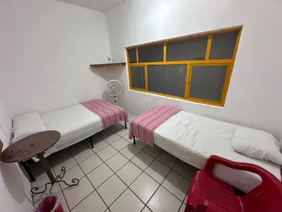 Cama o camas de una habitación en Hostal Zipolite Arteaga