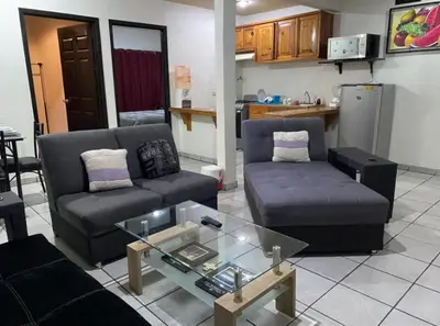 Una cocina o zona de cocina en Departamento con terraza lobo