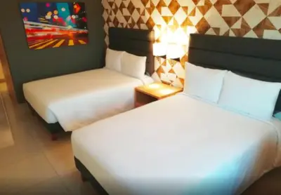 Cama o camas de una habitación en Hotel Urbainn