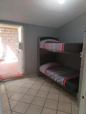 Cama o camas de una habitación en Casa en Cuernavaca Casa Luz