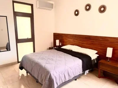 Cama o camas de una habitación en A Estrenar Alberca Vista al Río y Mar con AC