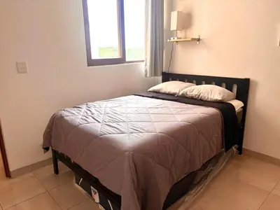 Cama o camas de una habitación en A Estrenar Alberca Vista al Río y Mar con AC