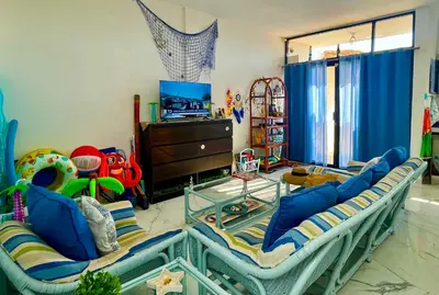 Una televisión o centro de entretenimiento en Casa de Playa en Antón Lizardo con alberca privada y club Playa