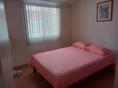 Cama o camas de una habitación en Casa en condominio 2R alberca compartida