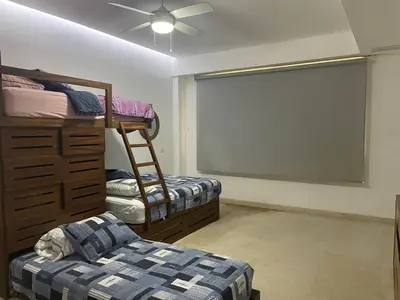 Cama o camas de una habitación en Exclusivo Departamento con vista al mar, alberca y gimnasio