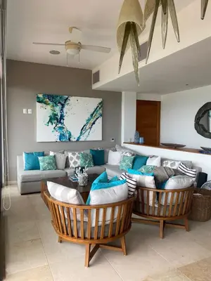 Zona de estar de Exclusivo Departamento con vista al mar, alberca y gimnasio
