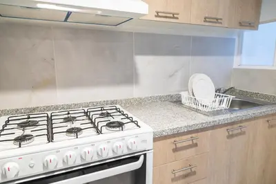 Una cocina o zona de cocina en Depa Aria Puebla