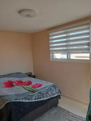 Cama o camas de una habitación en Recámara céntrica funcional