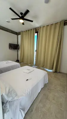Cama o camas de una habitación en Casa de Playa