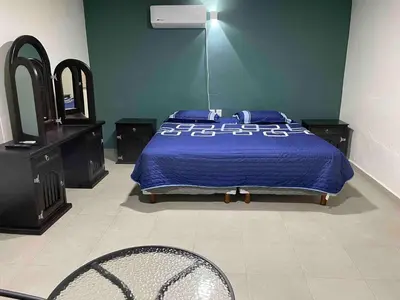 Cama o camas de una habitación en Departamento Oaxaca 10 min del centro