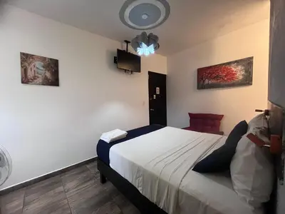 Cama o camas de una habitación en Hotel Gandag
