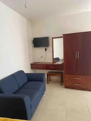 Una televisión o centro de entretenimiento en Casa con alberca