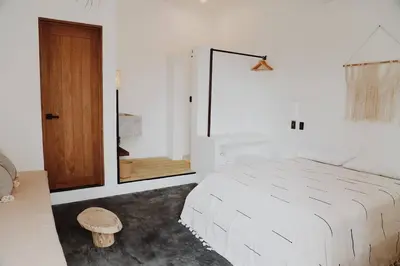 Cama o camas de una habitación en Casa Ohma La Punta