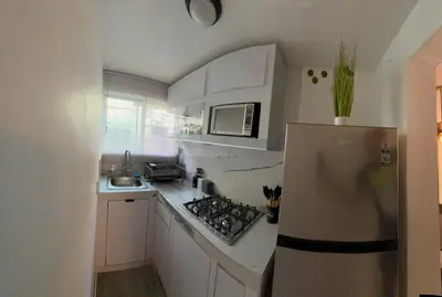 Una cocina o zona de cocina en Excelente departamento en jardín Balbuena y mundial de futbol 2026