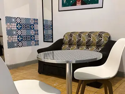 Zona de estar de Departamento a 4 min del Centro