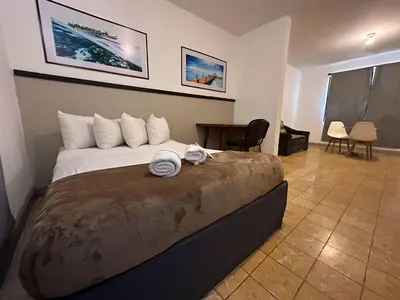 Cama o camas de una habitación en Departamento a 4 min del Centro
