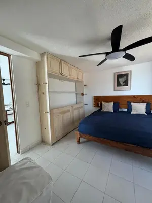 Cama o camas de una habitación en Departamento en Lomas de Costazul