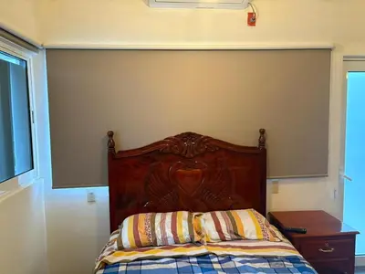 Cama o camas de una habitación en Cuartito Modesto del precioso