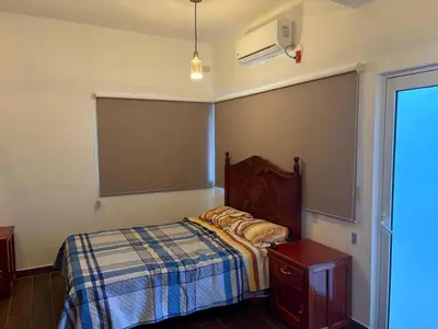 Cama o camas de una habitación en Cuartito Modesto del precioso
