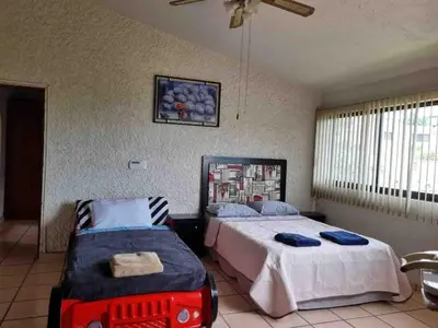 Cama o camas de una habitación en Tu casa en cuerna