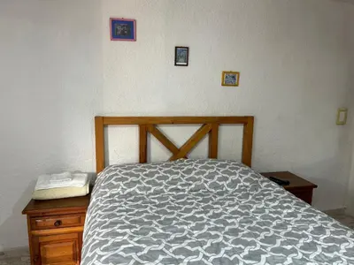 Cama o camas de una habitación en Minidepa confortable y tranquilo