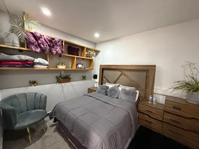 Cama o camas de una habitación en Suites vergel balcón
