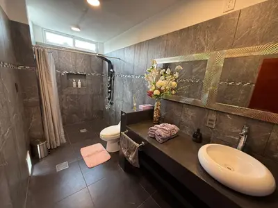 Un baño de Suites vergel balcón