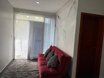 Zona de estar de Suites vergel balcón