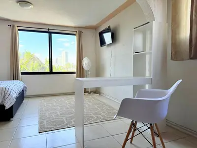 Cama o camas de una habitación en Departamento enteró en Mayorazgo
