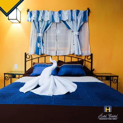 Cama o camas de una habitación en Hotel Cristal Chignahuapan