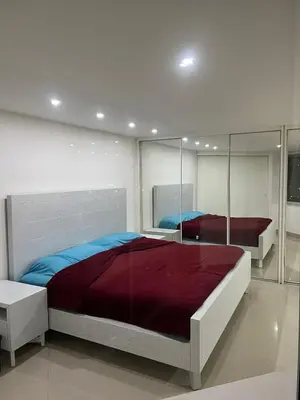 Cama o camas de una habitación en Spectacular PH with office in front of Perisur