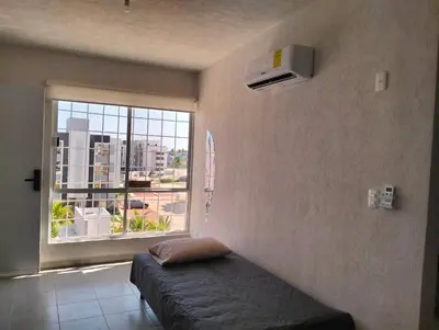 Cama o camas de una habitación en Departamento de descanso