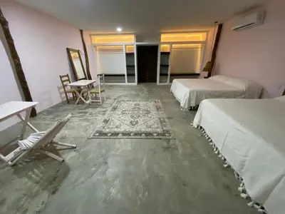 Cama o camas de una habitación en Cabañas y Restaurante La Luna