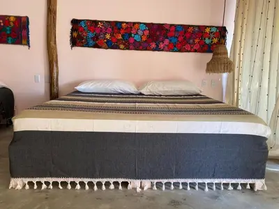 Cama o camas de una habitación en Cabañas y Restaurante La Luna