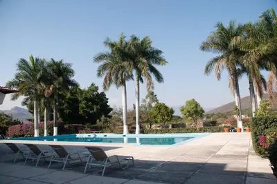 Piscina en o cerca de Exclusivo Paraíso Finca Chamilpa en Yautepec