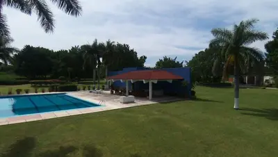 Piscina en o cerca de Exclusivo Paraíso Finca Chamilpa en Yautepec