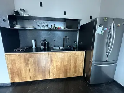 Una cocina o zona de cocina en Apartment with balcony in the heart of the city